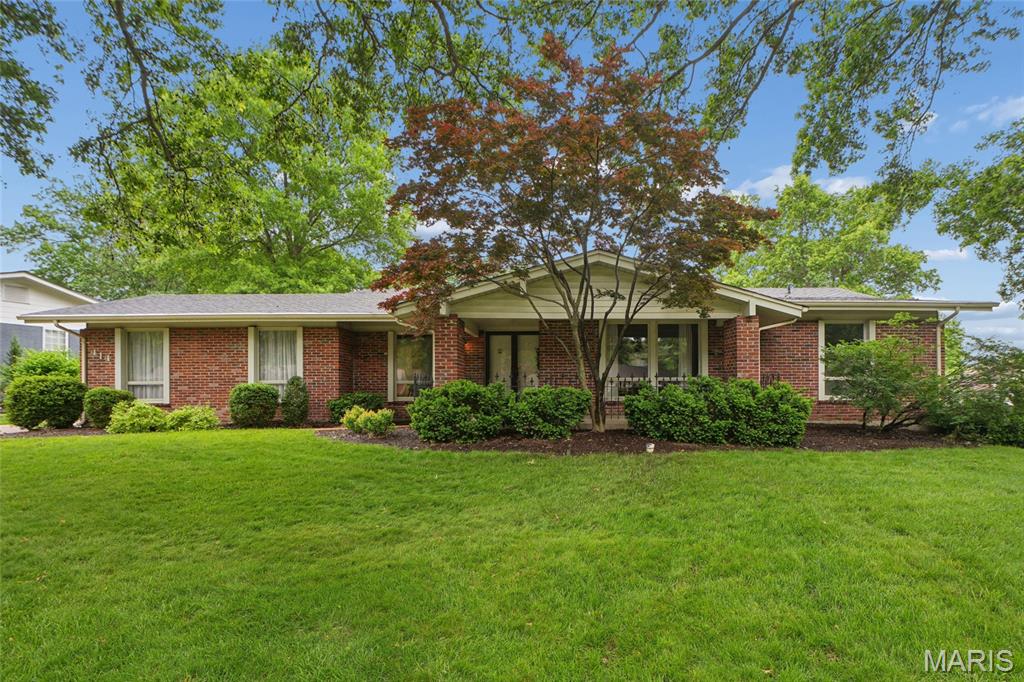 Welcome to this updated 4-bedroom, 2.5-bath home in the highly sought-after Claymont 9 subdivision in Ballwin, located in Parkway School District. With over 3,300 sq ft of total living space, this move-in-ready home features a fully remodeled kitchen (2022) with Energy Star stainless steel appliances, terrazzo tile flooring, and an open, functional layout perfect for entertaining. Hardwood floors run throughout the main living areas and all four bedrooms, with parquet hardwood in the living room adding character and charm. The spacious primary suite and generously sized bedrooms offer flexible space for families, guests, or a home office. A partially finished basement provides additional living space, plus sump pumps and a radon mitigation system for peace of mind. Step outside to a private backyard with a paver patio and partial privacy fence—ideal for outdoor living, kids, or pets. Additional features include a 2-car rear-entry attached garage and a newer roof (approx. 6 years old). Conveniently located near parks, shopping, dining, and easy highway access, this Ballwin home checks all the boxes for space, updates, and location.
