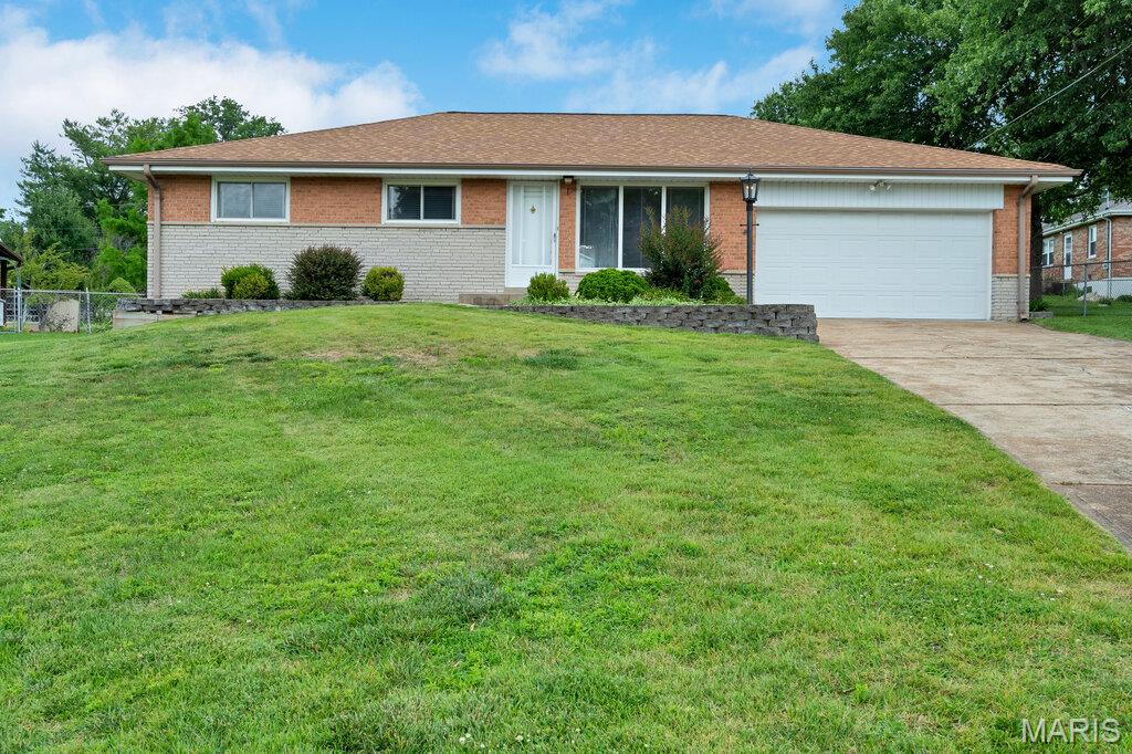 Fantastic ranch in Lindbergh Schools! Cul-de-sac and oversized lot! 2 car garage with finished lower level and a price that can't be beat! This home features nearly 2300 total sq feet, original hardwoods under the carpet, a fantastic back yard scene perfect for entertaining and activities. It also has a versatile floor plan with large kitchen, breakfast room plus separate dining! The living room is full of natural light and large! Bedrooms are great sizes and the main level has a full bathroom and a primary half bath! The lower level features a HUGE rec room area plus wet bar and more! There's a full functional bathroom there too, plus plenty of closets, storage and workshop area. This home also has a whole house fan, 200 amp service, updated shower ('23) and a PASSED St. Louis County Occupancy.