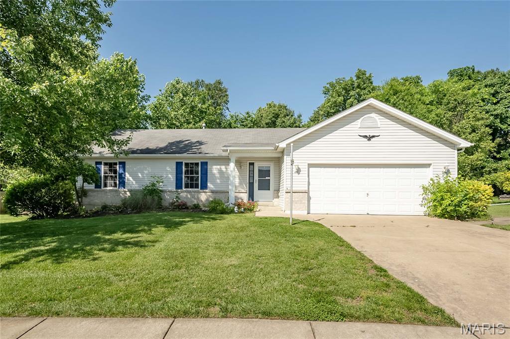 NEW ROOF BEING INSTALLED! Ranch home in desirable Wentzville location! Vaulted great room features gas fireplace. Updates throughout include LVP flooring, fresh paint, stair carpeting, new kitchen sink.  Kitchen features many cabinets and you can pull up a stool to the breakfast bar. Primary suite has a spacious bathroom and walk-in closet. Main floor laundry. 
 Enjoy your coffee from the patio that  overlooks a lovely, level (very private!) .38 acre lot that backs to trees. Unfinished lower level is ready for your finishes. Seller is offering a one year HSA Home Warranty.New architectural shingle roof to be installed prior to closing - buyer may select color.
This lovingly maintained one owner home was built by Bruner Builders.