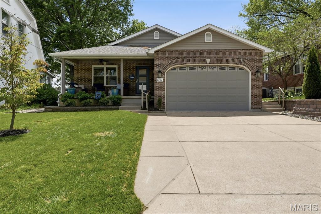 This is what a full renovation should look like! Completely reimagined from top to bottom, this 3 bed, 3 bath home offers nearly 2000 sq ft of thoughtfully designed living space, plus a partially finished lower level. This home offers thoughtful design, quality craftsmanship, and modern functionality in a highly desirable Shrewsbury location within Webster Groves School District. The main level features a bright, open layout that has been completely updated, and a seamless flow throughout. At the center of it all, the kitchen is a true standout with custom cabinetry, quartz countertops, a large center island, designer backsplash, and high-end finishes that make both daily living and entertaining effortless. Just off the light-filled rear living space overlooking the backyard, you’ll find a beautifully designed wet bar featuring a stunning custom countertop. The primary suite offers a private retreat with a beautifully updated bathroom and a custom walk-in closet, plus an additional second closet, while additional bedrooms are generously sized and filled with natural light. The lower level provides the perfect space for a second living space, rec room, home gym, or guest area, complete with a full bath. Step outside to a spacious brand new patio and fully fenced backyard with beautiful landscaping, offering the ideal setup for relaxing or entertaining. With every detail updated and all the work already done, this is a rare opportunity to own a truly turnkey home in one of the area’s most sought-after locations.