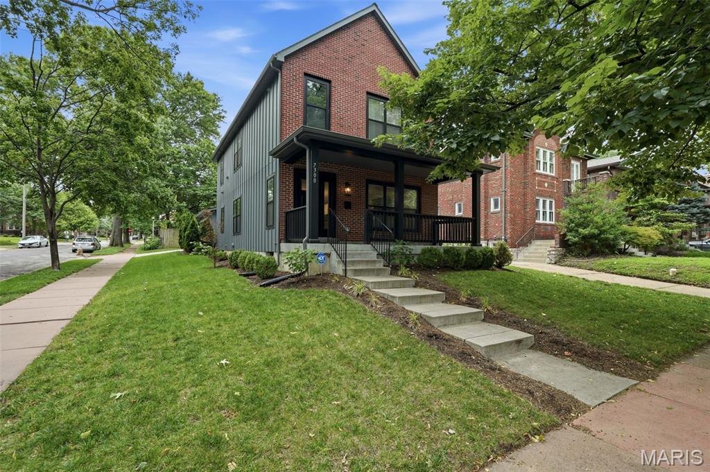 The New Kid on the block! Built in 2021, this beautifully maintained home offers the rare opportunity to enjoy modern construction in the heart of University City. Situated on a desirable corner lot, it strikes the perfect balance of low-maintenance living and private outdoor space, featuring a beautifully landscaped yard perfect for pets, entertaining, or simply relaxing, along with a finished detached two-car garage complete with an epoxy floor.

Step inside to discover a sweeping open floor plan accented by gleaming hardwood floors throughout both levels. The spacious living room is anchored by a sleek electric fireplace and flows effortlessly into the dining area and stunning kitchen, where quartz countertops, premium stainless steel appliances, a generous pantry, breakfast bar, and convenient main-floor powder room create the perfect setting for both everyday living and entertaining.

Upstairs, you'll find hardwood flooring throughout, two generously sized bedrooms, and a thoughtfully designed layout. The primary suite features a large walk-in closet and a beautifully updated bath with a curbless walk-in shower and brand-new double vanity. The convenient second-floor laundry separates the rooms, while the oversized second bedroom offers the flexibility to easily convert back into two separate bedrooms, creating a true three-bedroom home if desired (seller is willing to do this prior to closing).  An additional full bath with a tub completes the upper level.

With all major systems dating to 2021 and meticulously maintained, this home provides the peace of mind that only newer construction can offer. Located just minutes from parks, restaurants, shopping, Washington University, Clayton, and Forest Park, this is a rare opportunity to own one of University City's newest homes in an unbeatable location.