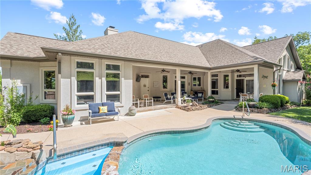 Experience the best of both worlds—peaceful privacy on 2.08 acres paired with the fun of lake living at the Lake of the Ozarks. Custom built with luxury and comfort in mind, this home features tall ceilings, extra-wide hallways and doorways, high-end finishes, and large windows showcasing beautiful backyard views.
The renovated kitchen is perfect for entertaining, while the stunning primary suite offers a private retreat. The layout works equally well for full-time living or hosting family and guests.
Outside, enjoy your own resort with a heated pool and waterfall, covered entertaining area, and mature landscaping creating a tropical escape. The large level driveway accommodates up to 12 vehicles plus RV or trailer parking, while gated access adds privacy.
Enjoy easy lake access via side-by-side, golf cart, or a short walk to the community dock with a 12’x32’ boat slip at the 31-mile marker in deep water. Located on the east side of Camdenton, you’re minutes from shopping, dining, and Highway 54.
An optional 40’x60’ Boat/RV garage is also available. This is more than a home—it’s lake living at its best.