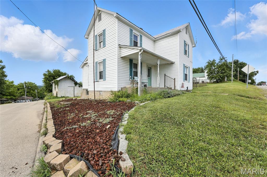Step back in time with this charming 3 bedroom, 1 bathroom - 100+ year-old farmhouse that blends vintage character with modern touches. Just waiting for your own personal touch! You'll find touches of original flooring throughout, complemented by a beautiful open concept kitchen. Situated on a spacious half-acre lot, there's room to roam, garden, play, or let the dogs run free. A large fenced-in area next to the home offers extra peace of mind for pets or kiddos. Enjoy summer evenings and cozy nights on the concrete patio, perfect for hosting gatherings, firing up the grill, or relaxing around a fire pit under the stars.
If you're looking for a home with heart, history, and room to design and grow, this farmhouse is calling your name! Schedule your showing today!