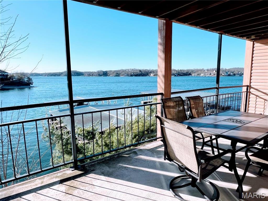 Turnkey waterfront condo investment at Lake of the Ozarks! This spacious unit comfortably sleeps up to 8 guests and is ideal for short-term rental income or personal lake getaways. The complex features two swimming pools including a lakeside pool, playground, and clubhouse for owners and guests to enjoy. And is accessible to all guests via two lakeside elevators. Conveniently located with all paved access (no gravel roads) and just minutes from Bagnell Dam, shopping, restaurants, and entertainment. A great opportunity to own a highly desirable lakefront rental property in one of Missouri’s top vacation destinations. Don’t miss this opportunity—schedule your showing today! Investment Opportunity! These units can be rented short-term on-Air B&B. Listed by Owner/Agent. Monthly HOA $900, paid quarterly.