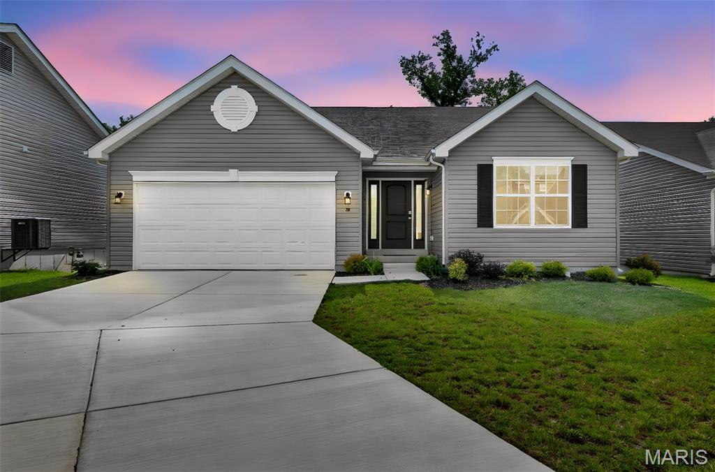 ONLY 2 YEARS OLD! ASPEN model home has 3 bedrooms (divided bedroom floor plan), 2 full baths and 2 car garage. Open floorplan with vaulted ceilings, and wood laminate (except in bedrooms) on main floor. Kitchen has 42" cabinets, SS appliances and a good sized breakfast room that looks out to backyard through sliding glass doors. The primary suite has a walk in closet and private bathroom with double sinks. 
2 secondary bedrooms share the other full bath on main floor. Walk-out LL has a rough in for a bath and is a clean, dry blank canvas to add to your total living sq ft! Make your appt today! 2-hour notice required per seller.