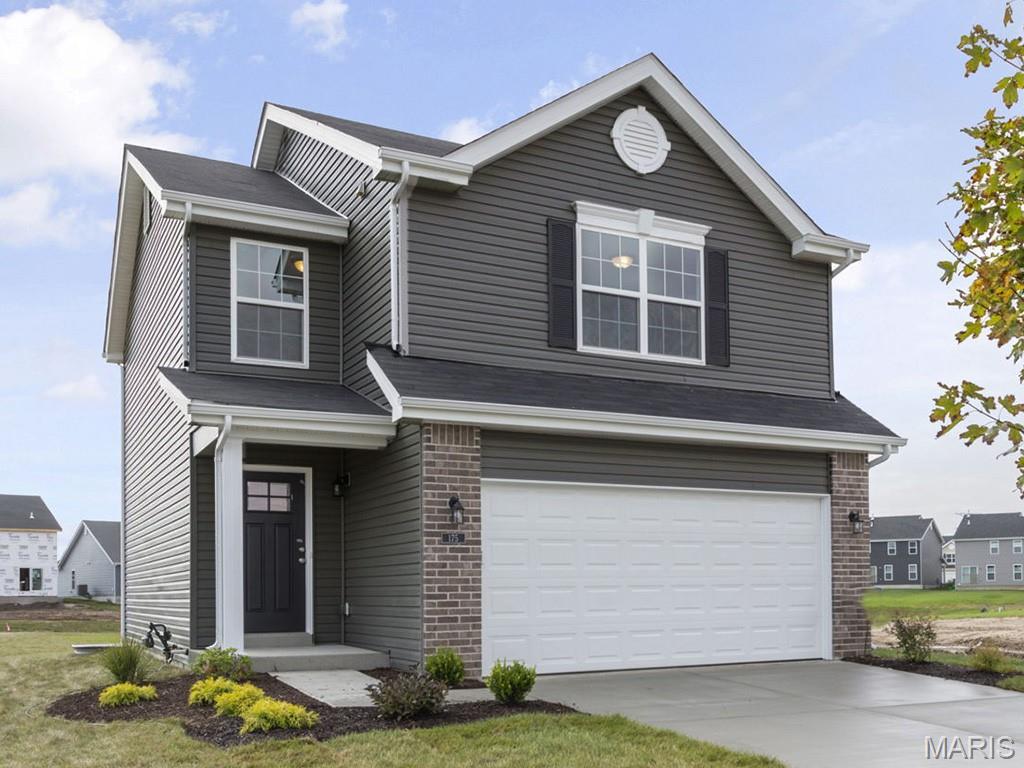 New McBride Burlington 2-story 3BR, 2.5BA home will be move-in ready this summer! The open floor plan is perfect for entertaining, with a spacious living room featuring a ceiling fan, large windows, & wood laminate flooring. The dining area opens to the backyard and flows into the kitchen w/a breakfast bar, Level 4 Brellin White 42” cabinets & stainless-steel GE appliances. The primary suite has a spacious walk-in closet & private bath w/a double vanity, enclosed toilet, linen closet, & 5’ walkin shower. Upstairs has a laundry room, 2 bedrooms w/walk-in closets, and a full bath. Additional features include a main floor powder room, a 2 car garage with coach lights, & white 6-panel interior doors. Regal Pines offers beautiful new homes in Ellisville with convenient access to shopping, dining, parks, and major highways for easy commuting throughout St. Louis County. Enjoy peace of mind with McBride Homes’ 10 year builders warranty & incredible customer service! Similar photos shown.