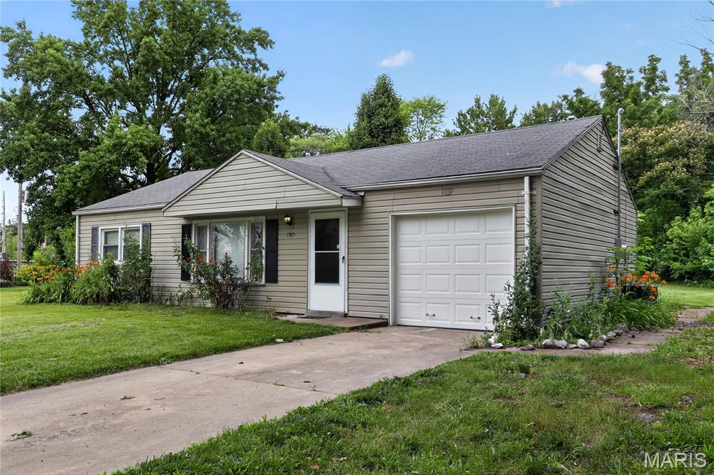Welcome home to this charm! This updated 2-bedroom, 1-bath home offers 948 square feet of comfortable living space, featuring durable, easy-to-maintain vinyl flooring throughout. The bright, functional kitchen provides ample space for dining and comes equipped with modern appliances. Situated on a generous 0.56-acre level lot, this property includes a detached 1-car garage and a gated backyard perfect for outdoor activities. Recently refreshed with new windows and a neutral paint palette. Conveniently located near local amenities.