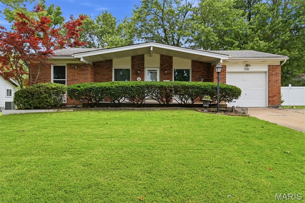 Comfortable three bed ranch on quiet, tree-lined street with lower level sleeping area and three full bathrooms. One car attached garage with internal home entry. Spacious open floor plan with hardwood oak flooring. Beautiful wood-burning fireplace in family room with custom mantel, and six panel doors. Kitchen includes corian countertops and under-cabinet lighting. Pleasant back yard with patio and mature shrubs. Passed Hazelwood occupancy inspection.