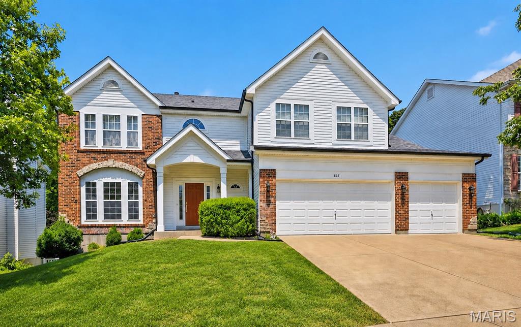 Beautifully updated 2-story in the Legends golf community!  Pleasing curb appeal with brick and stone accents, recently replaced architectural shingles, matching black gutters/downspouts & three car garage. Walk inside to soaring ceilings, curved archways, bright colors and numerous upgrades.  Entry foyer includes closet for coat storage & opens to a formal living room flanked by a formal dining room area.  Family room impresses with recessed lighting, ceiling fan, bay window extension with wall of windows & full fireplace with surround.  Gourmet, eat-in kitchen includes 42 inch cabinets, solid surface counters, custom tile backsplash, large center island, pantry & newer appliances.  Upstairs you’ll find a huge den area with vaulted ceilings, recessed lighting, neutral colored carpet/paint & 2nd level laundry. Master bedroom suite also features vaulted ceilings and a luxury master bath with soaking tub, custom glass shower enclosure and recently upgraded vanities/decor. 3 add. BR’s upstairs include one bathroom en suite and a jack and Jill style bath. Walk out lower level includes a rough-in and is ready to be finished.  Out back is a recently added, low maintenance composite deck, large concrete patio with covered area, fully fenced in yard and wooded common ground.  Recently replaced roof/gutters/downspouts & numerous windows on the rear of the home.  Walking distance to the legends Country Club, enjoy all of the neighborhood amenities and direct access to downtown Eureka via bicycle or golf cart.