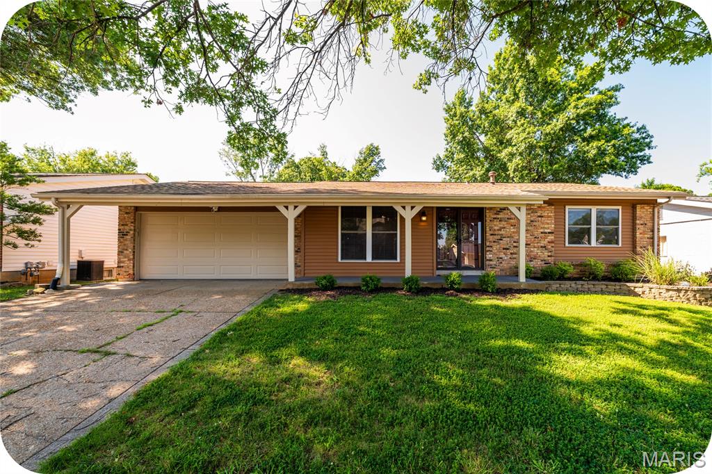 Open House, Sunday 1-3pm. Welcome home to a beautiful ranch home in Rockwood School District subdivision. Sidewalks, street lights, subdivision pool. The neighborhood has everything you need for many years to come! This home features a large living room area, for entertaining family and friends, a kitchen dining room combinations with a fireplace feature, lots of kitchen cabinets for all of your culinary tools and cookware. Walkout through the sliding glass door in the dining room area onto your covered patio and large fenced backyard, perfect for yard games, large gatherings and fire pit nights. Three good sized bedrooms, with plenty of closet space and new carpet. Full bathroom in the hallway and the primary bedroom has it's own full bathroom. Updates include : freshly painted throughout, new bathroom vanities, new carpet, new vinyl flooring in the partially finished basement, front landscaping. There is another room in the basement that could be used for a bedroom, office, workout room, you name it. Another full bathroom in the basement is a bonus! Basement has a lot of storage options and multiple uses in the finished space. Convenient location for shopping, entertainment, restaurants, and much more.
