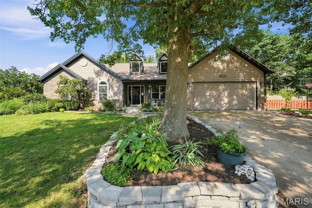 Open House on Saturday 07/11/2026 from 1-3 pm. This home is absolutely FABULOUS!! Open floor plan is perfect for entertaining, easy access to a huge fenced backyard and patio! Kitchen has beautiful granite tops, newer cabinets, center island, wine rack, stainless steel appliances with gas 5 burner range, d/w, microwave and a pantry! Open to vaulted great room with 2 skylights--bright and light! Sitting room can be formal dining area if you'd like! Ceramic tile in kitchen, dining, and all 3 full bathrooms! Vaulted ceilings in master bedroom and spa-like bath features separate shower and soaker tub! Lower level perfect for guests or whatever your heart desires with built-in entertainment shelving, convenient sleeping room and private full bathroom! Open floor for the perfect lower level! Subdivision even comes with a club pool! Nice big back yard, with patio; great for a table with an umbrella or outdoor lounge area perfect for get togethers and BBQ setup!