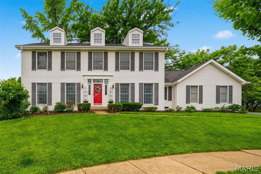 Stately two-story home in highly sought-after Scarborough Estates, offering unbeatable location, location, location near Town & Country Commons, top-rated Parkway West Schools, and quick access to Hwy 141 and 40. With nearly 2,600 sq ft, this 4-bed, 2.5-bath residence features a rear-entry garage and sits close to premier medical facilities. Cul de sac location providing minimal traffic on quiet street. 

The updated kitchen boasts 42" cabinetry, granite countertops, stainless steel appliances, gas stove top, and convenient main-floor laundry. Gorgeous hardwood floors flow throughout the first level, staircase, and upper hallway. The inviting family room includes custom built-in bookshelves, a gas fireplace, and elegant plantation shutters.

Upstairs, the spacious primary ensuite provides comfort and privacy. The lower level is ready for your finishing touches, offering excellent expansion potential. Enjoy your morning coffee or unwind at the end of the day in the peaceful backyard and patio area.

A beautifully maintained home in a prime location—this one checks all the boxes.