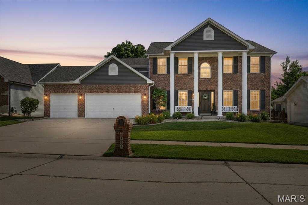 Stunning 1.5 story home in sought-after Homefield Estates offering over 4,000 sq ft of living space, a 3-car garage, and exceptional updates throughout. The impressive curb appeal is matched by an interior featuring soaring ceilings, hardwood floors, abundant natural light, and a dramatic great room with a floor-to-ceiling wall of windows and fireplace. The updated kitchen boasts quartz countertops, custom cabinetry, stainless steel appliances, center island, walk-in pantry w/ custom design. The spacious main floor primary suite includes a spa-like bath with dual vanities, walk-in shower, and custom walk-in closet. Generous secondary bedrooms, updated baths, flexible living spaces, and abundant storage make this home as functional as it is beautiful. Conveniently located near parks, shopping, dining, and major highways, this move-in-ready home offers the perfect blend of luxury, comfort, and everyday living.