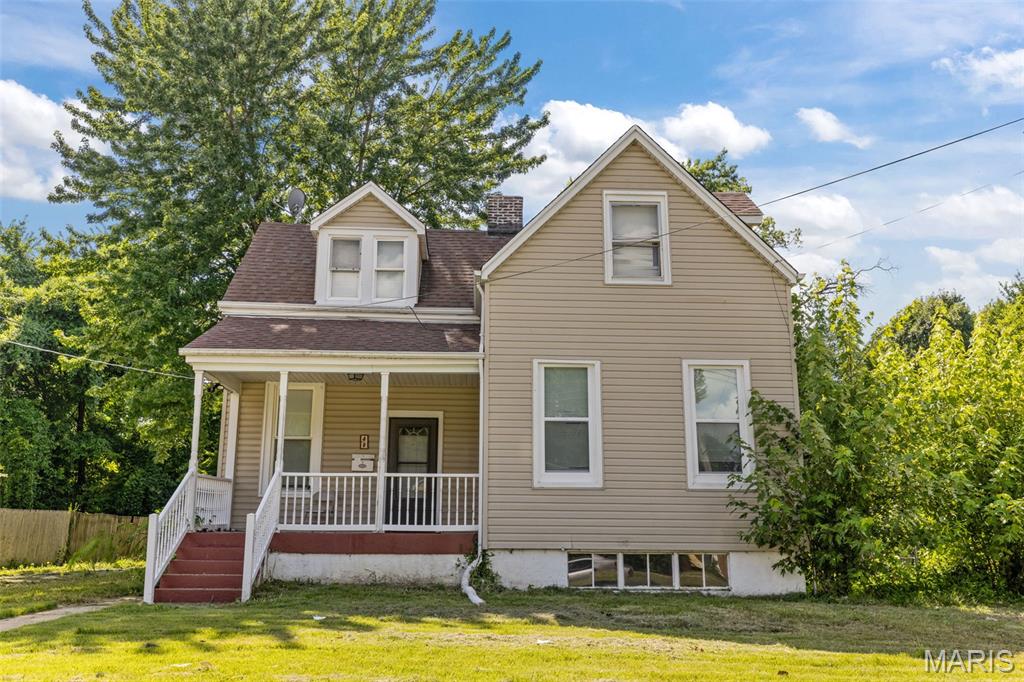 Great opportunity in Ferguson! This tenant-occupied 4 bedroom, 2 bathroom 1.5-story is ready for its new owners! Situated on a large quarter-acre lot just moments from Airport Road, nearby shops and restaurants, with quick access to I-170 and I-70, you'll have a great home in a convenient location. A welcoming covered front porch greets you and leads you inside. Modern updates mix with old-world charm: archways, millwork, 10-ft. ceilings with crown molding, built-in shelving alongside laminate floors, stainless steel appliances, and recessed lighting. The main-level bathroom has a step-in tile-surround shower, LVP flooring. You'll have a primary bedroom on the main level. Upstairs are three bedrooms and a full bathroom with tile-surround tub. A large basement provides extra storage space and walk-up access to the backyard. The patio overlooks the fenced yard shaded by tall trees. Home to be sold in as-is condition, seller to do no inspections or repairs. No seller financing. The current tenant pays $1,745.85 per month, plus $39.06 per month towards utilities.
