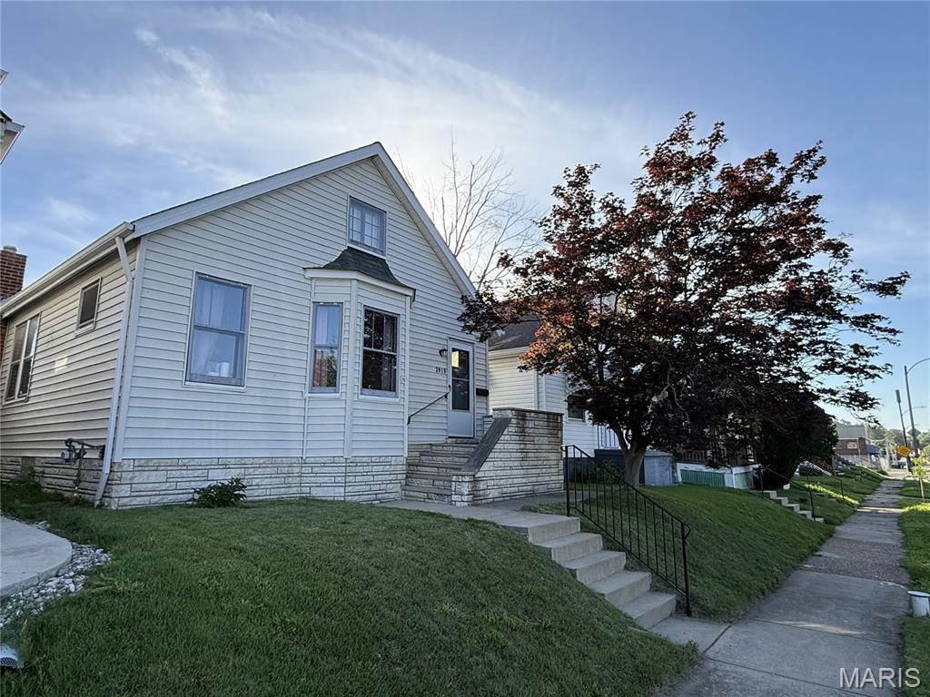 Perfect for buyers seeking an affordable home with room to grow or those ready to downsize without sacrificing comfort or functionality. This charming South St. Louis home offers the perfect blend of comfort, flexibility, and value. 2 spacious bedrooms, 1 full bath, and a versatile second-level bonus area that easily adapts to a bedroom, home office, workout room, or hobby space. The inviting sun porch overlooks a fully fenced backyard designed for relaxing and entertaining, complete with a fire pit and plenty of space for cookouts, pets, gardening, or gathering with family and friends. Washer and dryer included. One-car detached garage with opener. Located near neighborhood parks, shopping, restaurants, and major highways. Schedule a private showing today!