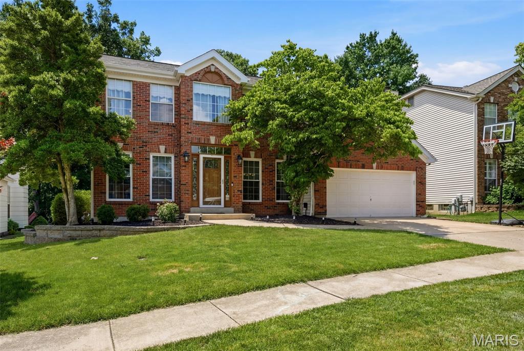 Welcome to this modern 2 story home with all the modern amenities including, main floor laundry, kitchen with gas range, granite counters and a breakfast room. Step out your back door onto your deck or sit under the fan on the covered part of the deck. Enjoy formal dinners in the large dining room appointed with gleaming wood floors & crown molding. Relax in front of the wood burning fire place in the family room & enjoy television under the sleek recessed lights. Entertain in the formal living room that has crown molding, recessed lights & beautiful wood floors.  The laundry rounds out the ground floor.  You are sure to be impressed with the top floor that included a coffered ceiling in the primary suite.  A modern bathroom with dual basins, soaking tub & huge shower with updated fixtures.  His & hers closets complete the primary suite. A full bath services 3 additional large bedrooms.  the lower level offers a large recreation room, study area, utility room & rough in for a bathroom.