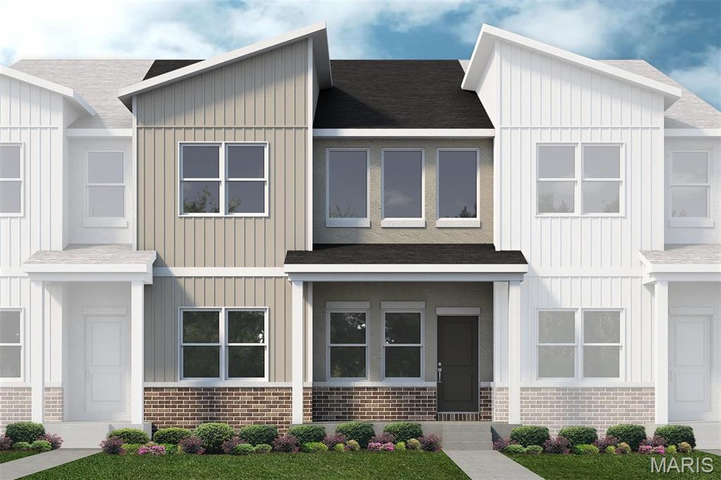Welcome to Lombardo Homes’ newest luxury modern lifestyle community—Crooked Creek at Cottleville Trails—ideally located in the heart of Cottleville. This thoughtfully planned neighborhood features the new Lifestyle 2-Story Townhomes and exceptional resort-style amenities, including a community pool and poolhouse, scenic walking trails, playgrounds, and inviting outdoor gathering spaces—all ready for the upcoming season.

The Wakefield floor plan offers a rare and desirable layout with a main-level primary suite and dramatic 2-story Great Room. This 3-bedroom, 2.5-bath home includes a 2-car rear-entry garage and over 2,000 sq. ft. of well-designed living space. The open main level features a spacious kitchen with adjoining dining area, powder room, family entry, and soaring Great Room. Upstairs you’ll find two additional bedrooms, a loft, laundry room, large walk-in closets, and added storage. A full basement provides excellent future finishing potential.

Designer-selected finishes include stainless steel appliances, upgraded cabinetry with hardware, quartz kitchen countertops, tile backsplash, luxury vinyl plank flooring, recessed lighting, a linear fireplace with wood mantel, and stylish metal stair spindles. Zoned HVAC enhances comfort and efficiency.

Currently under construction with anticipated June 2026 completion. Limited golf-cart parking/storage is available for lease on a first-come basis—perfect for enjoying the Cottleville lifestyle.