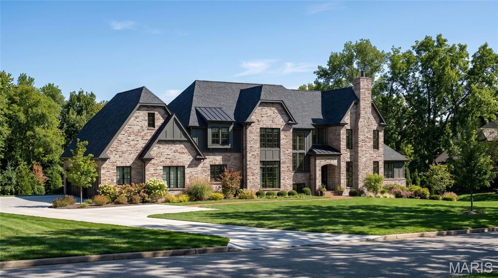 Build The Hawthorne on Manor Hill. A remarkable transitional estate designed for those who appreciate timeless architecture, exceptional craftsmanship, and a home tailored to the way they live. Offering over 6,375 square feet of thoughtfully designed finished living space on a picturesque 1.3-acre homesite, The Hawthorne I blends sophisticated design with everyday comfort.

A dramatic two-story foyer creates a stunning first impression with its grand staircase, soaring ceiling heights, and abundance of natural light. Beyond, the impressive great room showcases a vaulted ceiling with decorative beam details and expansive walls of windows, creating a bright and inviting atmosphere that seamlessly connects the home's main living spaces.

Designed with both grand entertaining and comfortable daily living in mind, the gourmet kitchen serves as the heart of the home with extensive custom cabinetry, a substantial center island, premium appliance options, and direct access to a covered outdoor living area ideal for year-round enjoyment.

The private main-level owner’s retreat offers a luxurious sanctuary featuring a spa-inspired bath with a freestanding soaking tub, oversized zero-entry shower, and expansive walk-in closet. Throughout the main level, 10-foot ceilings, wide-plank hardwood flooring, and custom architectural millwork showcase the level of craftsmanship and detail expected in a Kemp Signature Homes estate.

The upper level includes three spacious ensuite bedrooms, a flexible loft area, and a convenient second-floor laundry room. The finished lower level extends the home’s extraordinary livability with a large recreation room, walk-up wet bar, private guest suite, and full bath, with additional opportunities to personalize spaces for a fitness studio, golf simulator, wine cellar, theater, or other lifestyle amenities.
Set on a beautiful 1.3-acre homesite with room for a future pool, expansive patios, and exceptional outdoor living, this is a rare opportunity to create a fully customized luxury residence in one of the area’s most desirable settings.

Personalize The Hawthorne I with your own architectural selections, finishes, and design details. Floor plans, luxury features, and customization opportunities are available upon request. Renderings and photography may depict optional features, upgrades, and selections not included in the base offering. Pricing does not include swimming pools or specialty site improvements.