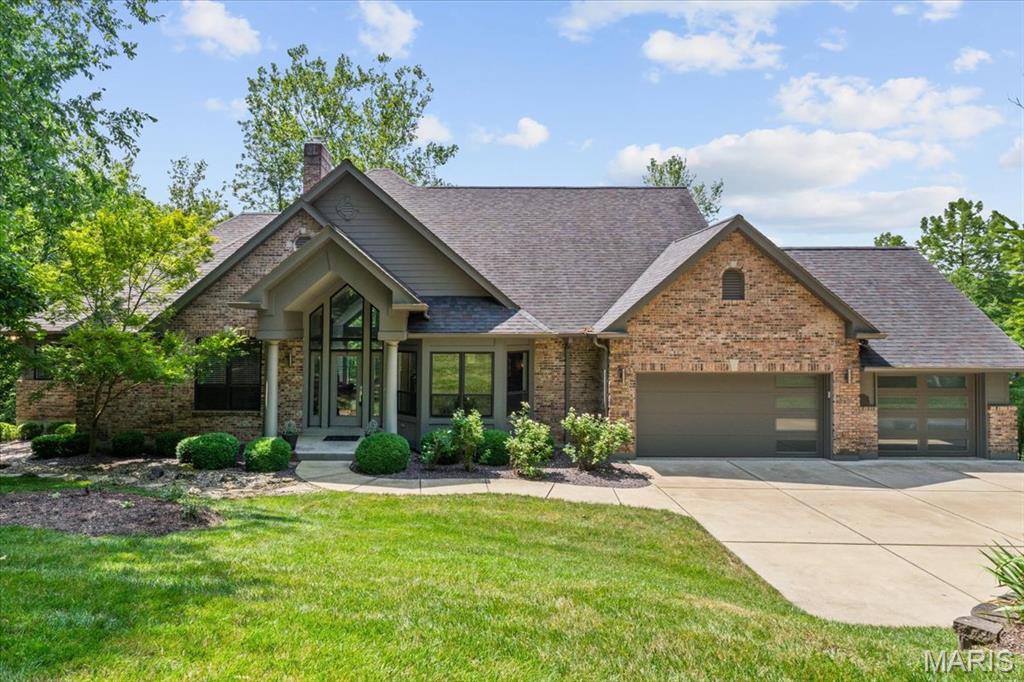 Nestled on an exquisite 1.7+ acre lot in a private neighborhood with walk-in access to Babler State Park, this custom atrium ranch is the epitome of refined living, offering the perfect harmony of elegance, comfort & function. Set against the serene backdrop of a pond, this residence delivers unparalleled tranquility & breathtaking views. Step into the impressive great rm with soaring vaulted ceilings, gas FP, & dramatic wall of windows framing the picturesque natural surroundings. The formal dining rm exudes charm with a bay window—ideal for hosting. At the heart of the home, the gourmet kitchen features a center island, breakfast bar, granite counters, dbl ovens, & top-tier appliances. Seamlessly connected are the cozy sitting rm & breakfast area, both offering access to the expansive composite deck & a screened-in porch—complete with a built-in grill & walk-behind wet bar, perfect for entertaining. The luxe primary suite boasts wood floors, bay window, 2 walk-in closets, & en-suite bath with dbl vanities, custom walk-in shower & separate soaking tub. Add'l bedrm/office & full bath complete the ML. The walk-out LL offers a spacious family rm with a 2nd FP, wet bar, sitting area, 4 generous bedrms, & 2 full baths—ideal for guests or multi-generational living. Additional highlights include a fully fenced yard, oversized 3-car garage & captivating pond views. A rare offering combining impeccable craftsmanship with resort-style living—this is a home that truly has it all.