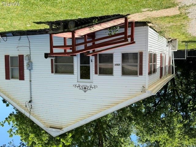 Ranch - 3 bedroom, 1 bath with mostly wood floors, front enclosed porch, roof and mini split 2 years in age. Fenced back yard