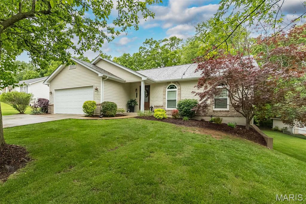 OPEN HOUSE CANCELLED! Nestled on a beautifully landscaped lot with a phenomenal private backyard, this beautifully updated 3-bedroom, 2-bath home in Warrenton offers the perfect blend of style, comfort, and major updates! This home features Pergo waterproof laminate wood flooring throughout, combining durability with a warm, modern feel. The stunning kitchen features 42” white soft-close cabinets with elegant crown molding, quartz countertops, white tile backsplash, stainless steel appliances, a spacious pantry, and an eat-in dining area. The large living room boasts vaulted ceilings and abundant natural light. Major improvements include all new Pella windows completed in fall 2021, new exterior doors, HVAC replaced in 2018, roof/gutters/gutter guards new in 2025, and a hot water heater new in 2021. Enjoy premium water quality with a whole-house water softener, carbon tank, and reverse osmosis system at the kitchen sink. The unfinished walk-out lower level offers endless possibilities with two lookout/egress windows and a rough-in for a full bath. Outside, the incredible backyard is surrounded by a thick tree line for added privacy and features a shaded patio/small basketball court plus a spacious deck perfect for entertaining or relaxing. The beautifully designed landscaping is enhanced with hard-wired low-voltage lighting, creating stunning curb appeal both day and night.