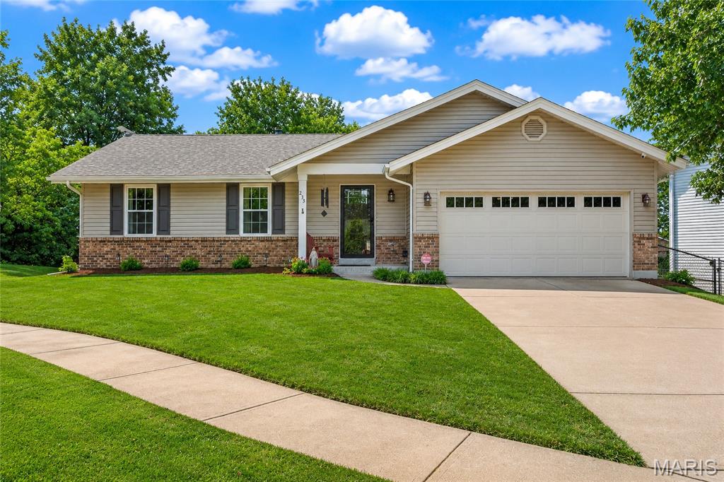 235 Surrey isn't just an address, it's a HOME that's been exceptionally cared for. Lovingly maintained by its original owners, this move-in-ready ranch reflects decades of thoughtful ownership and quality improvements. Situated on a cul-de-sac in the heart of O'Fallon with no HOA, this home offers the perfect combination of comfort and convenience.

Hardwood flooring, durable tile, and two fireplaces; a wood-burning fireplace in the living room and a ventless gas fireplace in the lower level, add warmth, character, and functionality throughout. The floor plan features 3 bedrooms and 2 full bathrooms on the main level, along with a finished lower level complete with an additional full bath and expansive living area. 

Step outside to the upgraded patio overlooking the backyard, creating an inviting outdoor living space, while the Rain Bird irrigation system helps keep the landscaping looking its best.

Adding even greater value is the extensive list of major improvements already completed, including a new Lennox high-efficiency HVAC system (2025), roof, siding, gutters, and fascia (2024), commercial-grade water heater (2022), garage door with LiftMaster opener and battery backup, windows with a transferable lifetime warranty, water softener, and security system.

With original ownership, significant capital improvements, no HOA, and convenient access to parks, shopping, dining and major highways, 235 Surrey offers a rare opportunity to own a home that has been maintained with exceptional care and is ready for its next owner.