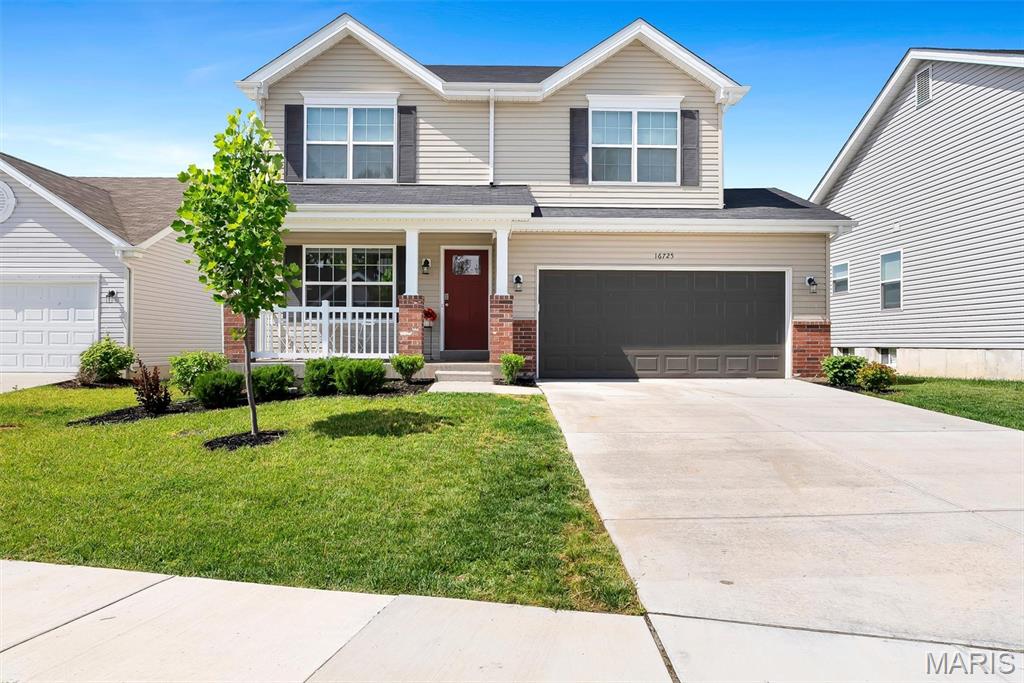 Experience refined living in this exceptional, MOVE-IN NEWER residence, thoughtfully crafted with over $46,000 in premium upgrades. A charming covered front porch welcomes you into a sun-filled interior, where expansive windows and an elegant, chandelier-lit stairwell create a striking first impression.

The gourmet kitchen serves as the home’s centerpiece, showcasing Silestone quartz countertops, an impressive island, abundant custom cabinetry, and two spacious pantries—a rare luxury at this price point. The adjoining hearth room and dining area offer an inviting, open-concept flow ideal for both everyday comfort and elevated entertaining.

Upstairs, discover four generously sized bedrooms, each featuring its own walk-in closet, delivering storage and privacy. The lower level extends the home’s potential with an egress window and bath rough-in, providing a perfect canvas for a future suite, entertainment space, or fitness retreat.

A newer-construction home of this caliber—fully finished, beautifully upgraded, and ready for immediate enjoyment—is a rare find. Make your appointment today!
