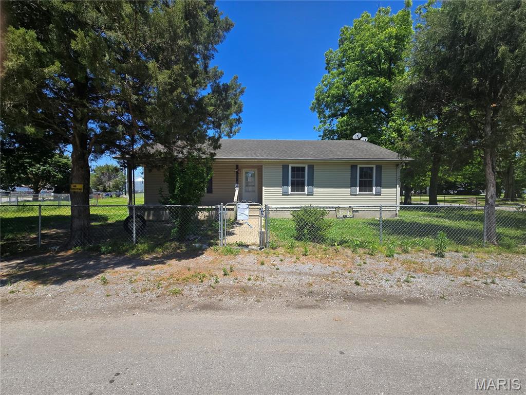 Looking for space, functionality, and a huge fenced backyard? This 3 bedroom, 2 bathroom home checks all the boxes! Situated on a .37 acre lot, this property offers plenty of room both inside and out with a fully fenced yard perfect for kids, pets, entertaining, or simply enjoying your own private outdoor space.

Inside, you’ll find a spacious living room, dining area, kitchen, and dedicated laundry room designed for everyday convenience. The split layout of the home provides comfortable bedroom sizes and flexibility for families, guests, or a home office setup.

The oversized backyard offers endless possibilities — add a firepit, playset, garden, pool, or outdoor entertaining area with room to spare. Mature shade trees and the fenced lot create a setting that feels private while still being close to town amenities.

Whether you’re searching for your first home, needing more space, or looking for an investment opportunity, this property has the size, layout, and yard that are hard to find at this price point!