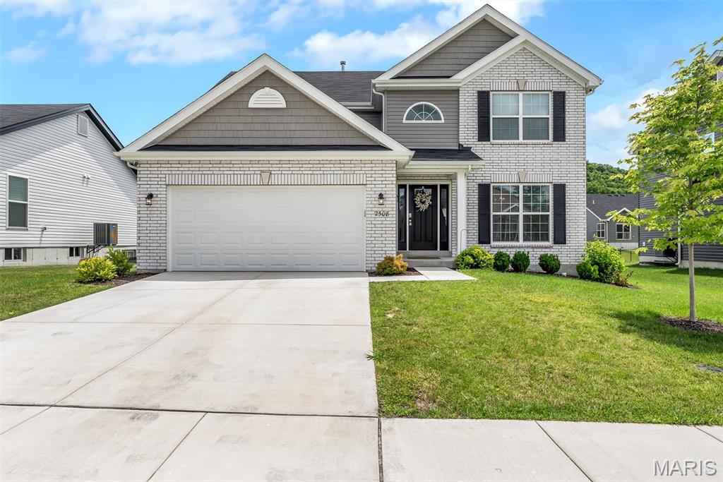Why wait to build when this beautiful, move-in-ready 2-story home is ready now? Like new WITH a deck, fence, AND patio. No need to wait to build, PLUS the added expense of installing a deck after moving in w/ new construction (Royal II floorplan)... 2508 Chukka Dr. has done the upgrades just in time for you to enjoy summer in your new backyard! This home offers 4 bedrooms, 2.5 baths, and over 2,000 square feet of thoughtfully designed living space, combining modern style with everyday functionality. The open floor plan features durable wood-look flooring throughout the main level, abundant natural light, and a spacious family room perfect for gathering with family and friends.
The kitchen is the heart of the home, boasting quartz countertops, a center island with a breakfast bar, 42-inch cabinetry, stainless steel appliances, a walk-in pantry, and an adjoining breakfast room with sliding glass doors leading to the outdoors. Step onto the expansive composite deck overlooking the fully fenced backyard—ideal for entertaining, relaxing, or letting pets and children play safely. A dedicated pad is already in place for a future hot tub, creating the perfect space for outdoor enjoyment.
A formal dining room provides additional room for hosting guests, while the convenient main-floor laundry and powder room add everyday practicality. Upstairs, the spacious primary suite offers a walk-in closet and private bath featuring double vanities, a walk-in shower, and soaking tub. Three additional bedrooms and a full hall bath provide plenty of space for family, guests, or a home office. The full basement with an egress window and a bath rough-in offers endless opportunities for future finishing and additional living space. Located in desirable Polo Grounds Manors within the Rockwood School District, this home offers the perfect blend of comfort, style, and convenience.