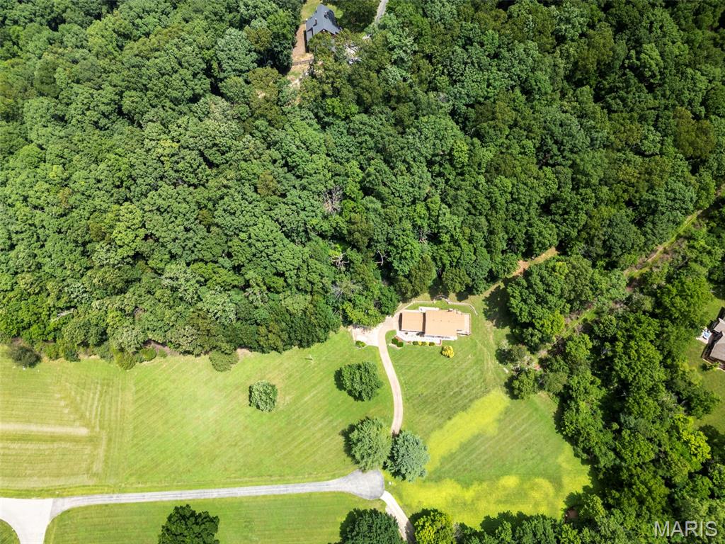 FIRST TIME ON THE MARKET!!! LOT 58 Hawks Rest - Equestrian Property Nestled on 3 picturesque acres in Wildwood within the award winning Rockwood School District. Build your dream Home and bring your horses and chickens!! This picturesque property will not last long!!