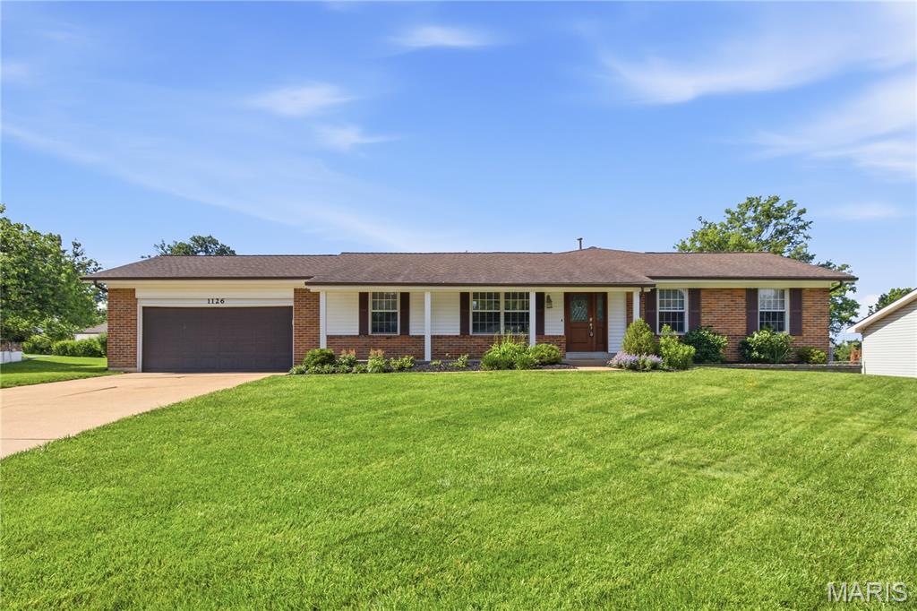 Meticulously updated 3 bed, 2 bath ranch.  Every detail hints at the quality you'll find inside this home.  
The spacious primary suite has been completely updated and includes a very large walk-in closet.  The fully remodeled primary bathroom includes a new double vanity/sink top, new floor and fixtures, a beautiful free standing tub, and separate shower.
The main level features a huge great room with recessed lighting, highlighted by new quality LVP flooring.  It also includes a first floor easy-access laundry room which can accommodate a gas or electric dryer.  No more hauling laundry up and down steps!  The large combination dining/sitting room provides ample space for any size gathering.  The kitchen boasts all new stainless steel appliances and bright new quartz countertops and stainless sink, all on beautiful quality all-wood cabinetry.  The breakfast area enjoys a large bay window with a convenient separate set of cabinets and countertop perfect for additional storage, supplies, or a charging station.
High quality Pella wood windows throughout provide a warm and bright feel to all rooms.
A large patio accessible from the great room overlooks a large backyard completely enclosed with an attractive white vinyl fence. 
The basement is a clean and bright open space with new windows, new lighting, and a small room suitable for storage or as a remote office. 
Additional highlights include an oversized attached 2-car garage, 0.28 acre lot, lush lawn, lovely landscaped beds with healthy plants, and no HOA fees.  Located in a highly desirable area, you'll enjoy easy access to shopping, dining, and the scenic beauty of Ellisville's network of eight connected parks and trails.  All within the highly rated Rockwood School District!