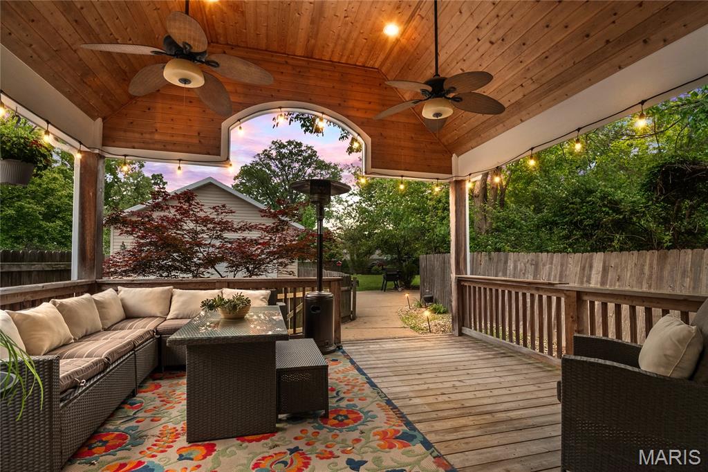 Step into a timeless masterpiece where historic charm meets contemporary luxury. This magnificent 1912 Brentwood farmhouse has been thoughtfully reimagined for the discerning homeowner, offering an unparalleled living experience. Your next chapter begins the moment you cross the threshold. Envision mornings in the vaulted great room, dinners in the chef’s kitchen, and evenings on the covered deck. This home offers 5 bedrooms (2 ensuites - one on the main level), 4.5 baths, and a six-car garage on a 0.4 acre lot with over 3,700 total square feet. Updates include a custom kitchen with a center island, quartz countertops, a prep sink, and high-end stainless appliances. The great room addition features a vaulted ceiling, stone fireplace, recessed lighting, and a wet bar. The main floor primary suite has a walk-in closet and double vanities. Four bedrooms are on the second level, including a second ensuite. The lower level has 9’ ceilings under the great room addition, with a home office, fourth bath, and space for a gym or play area. The yard has a covered, vaulted deck, a large patio, a fenced yard with landscaping, and in-ground irrigation and ample space for a future in-ground pool. The six-car garage offers storage and workspace while the freshly sealed driveway provides ample space for guest parking. Features include three HVAC zones, two water heaters, plantation shutters, heated bath floor, jetted tub, a new gas range, and a wine refrigerator. This home is a must see!