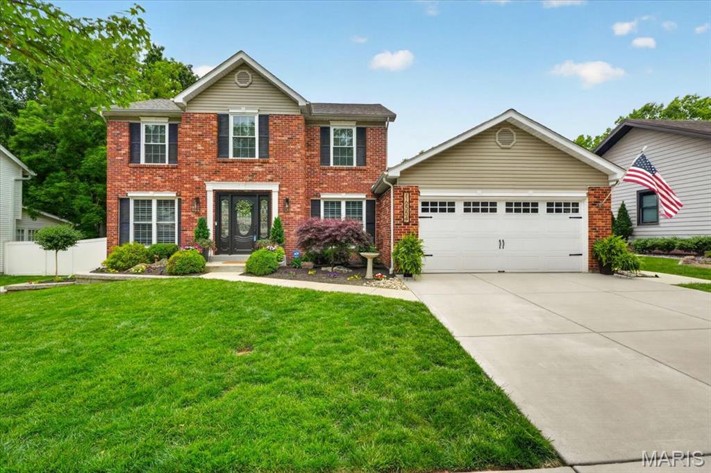 Beautifully updated 2-story home ideally located within walking distance to Wildwood Town Center and directly across from Green Pines Elementary school. Freshly painted throughout with recent updates, including new trim, lighting, hardware, landscaping, retaining wall, exterior lighting, and more. The welcoming entry foyer features a custom front door and staircase with wood spindles. Spacious living and dining rooms offer decorative molding, updated lighting, and plantation shutters. The family room is centered around a brick gas fireplace and features a large bay window with professionally tinted windows overlooking the backyard. The kitchen offers custom cabinetry with soft-close doors, granite counters, tile backsplash, under-cabinet lighting, stainless steel appliances, pantry, and adjoining breakfast room with bay window and access to the deck and pool area. Main floor laundry. Upstairs, the vaulted primary suite features a walk-in closet with organizers and an updated ensuite bath with double vanities, granite countertops, soaking tub, separate shower, and updated lighting and mirrors. Three additional bedrooms and an updated full bath complete the upper level. Finished lower level includes a large family room, game area, office or playroom with built-in shelving, and abundant storage space. Enjoy the backyard with a large deck, above-ground pool, white vinyl privacy fence, and updated landscaping, creating a great space for relaxing or entertaining.