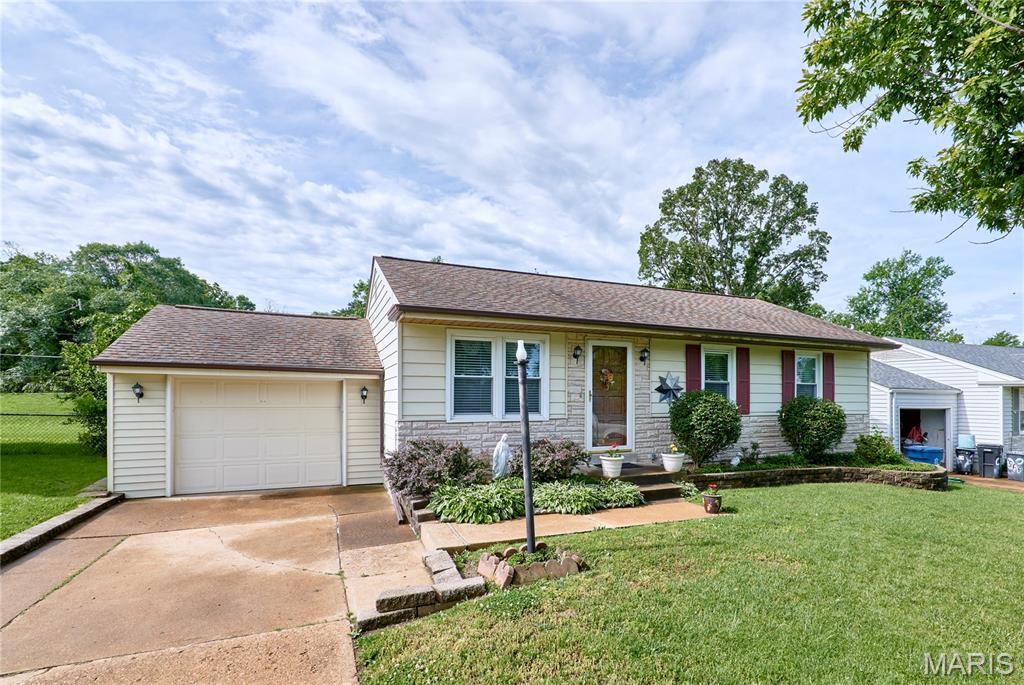 Charming and well-loved ranch home tucked away on a quiet cul-de-sac! This 3BR/2BA home offers 1,221 sq. ft. on the main level with numerous updates and so much living space to enjoy. Proudly owned and meticulously cared for by the same owner since 1974, this home reflects years of pride in ownership. The spacious family room addition, completed in 1991, features vaulted ceilings, a cozy gas fireplace, and exterior doors leading to both the backyard and side yard—creating the perfect space for relaxing or entertaining. The main floor includes an eat-in kitchen, front living room, full bath, and 3 bedrooms, with original hardwood flooring under the carpet in the bedrooms and front living room. The partially finished lower level adds even more functional space with a family room featuring an electric fireplace, full bath, and additional room ideal for an office, hobby area, or recreation space. Step outside to enjoy the fenced backyard with a deck, storage shed, mature landscaping, and convenient walkway surrounding the home. The garage offers an exterior access door to the backyard, plus a gate leading to the front yard for added convenience. This home offers comfort, character, and endless potential in a desirable location! Seller offering a $3000.00 flooring allowance credit to Buyer.