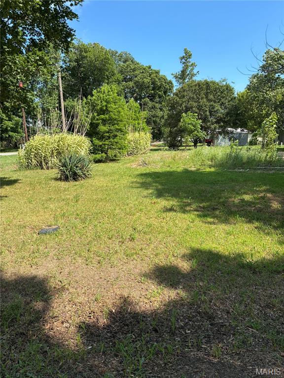 Pretty corner lot(s) (2 lots) in Morehouse offering plenty of space with utilities available. An excellent opportunity to build your dream home, place a manufactured home, or develop rental property. Convenient location with plenty of potential.