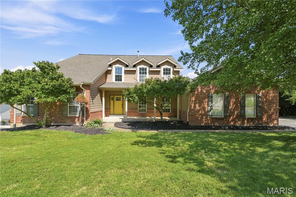 Welcome to this exceptional 1.5-story home nestled on a quiet cul-de-sac in the heart of Wildwood. Featuring 4 bedrooms and 4.5 baths, this home offers the perfect blend of luxury and comfort. The stunning great room showcases soaring ceilings, abundant natural light, and an open, inviting feel. The main-level primary suite features a vaulted ceiling and spacious ensuite bath, while the upstairs bedrooms are generously sized with vaulted ceilings, a private bath, and a Jack-and-Jill bath.

The finished lower level is built for entertaining with a wet bar, expansive recreation space, and plenty of room to gather. Step outside to the newer deck overlooking nearly an acre of beautifully fenced backyard—perfect for entertaining, play, or relaxing. Located in the award-winning Rockwood School District, this home offers exceptional living in one of Wildwood's most desirable locations.