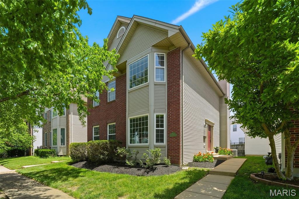 Gorgeous two-story home located in the highly desirable gated Village of University Place! Beautifully maintained and move-in ready, this home offers timeless appeal with a dramatic two-story entry foyer, formal living room, and elegant dining room. The refreshed kitchen is designed for both everyday living and entertaining, featuring stainless steel appliances, granite countertops, a breakfast bar, abundant cabinetry, and a walk-in pantry. A sunny breakfast area flows seamlessly into the inviting family room, complete with a cozy fireplace and direct access to the patio and private back yard. Convenience abounds with a main-floor laundry area and an oversized attached two-car garage offering ample parking and storage space. Upstairs, you'll find three generously sized bedrooms and two full baths,  including an expansive primary suite with a vaulted ceiling, a large walk-in closet, and a luxurious ensuite bath featuring dual sinks, a separate shower, and a soaking tub. The partially finished carpeted lower level provides additional living space with a recreation room, while the unfinished area offers exceptional storage potential. Perfectly situated in a community just blocks to dining, shopping, and everyday amenities, this exceptional home combines comfort, style, and convenience in one outstanding package. Schedule your private showing today!