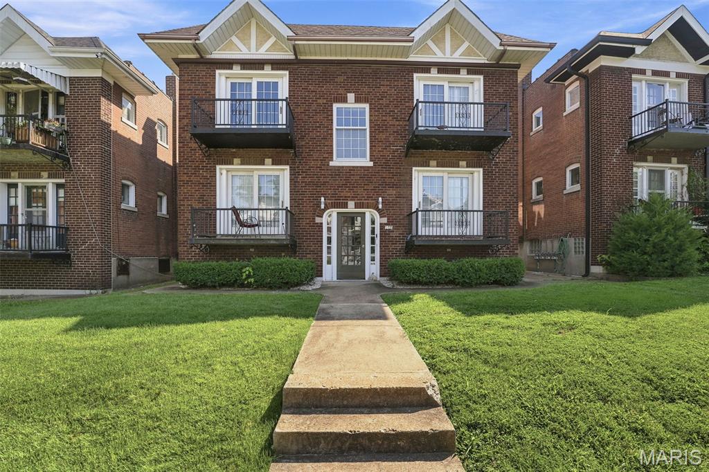 Solid 4-Family Opportunity in the Heart of Northampton! Gorgeous well-kept large building with marble entry & stairs. Each of the four apartments offers a spacious, functional layout featuring a living room, a true dining room, kitchen with eat-in area, full bath, a large private  bedroom PLUS a charming front balcony! Beautiful refinished hardwood floors add warmth and character, while thoughtful updates throughout the building include newer furnaces, updated plumbing stacks, upgraded electrical panels, and one unit with central air (the remaining units are equipped with window A/C units). An oversized detached brick two-car garage provides an additional income stream, currently rented for $200 per month. Whether you're looking to expand your investment portfolio or searching for the ideal owner-occupant opportunity, this well-maintained four-family delivers. Live in one unit while the rental income helps offset your mortgage, or enjoy immediate cash flow with three of four apartments currently leased to excellent tenants. Located in the heart of Northampton, you'll be within walking distance of neighborhood favorites including The Golden Hoosier, Piper's Tea & Coffee, Bud's Pizza, and the exciting growth and redevelopment happening along Kingshighway. Currently professionally managed, combining classic South City charm, strong rental performance, and a prime location, this turnkey property offers an outstanding opportunity for both investors and owner-occupants alike.
