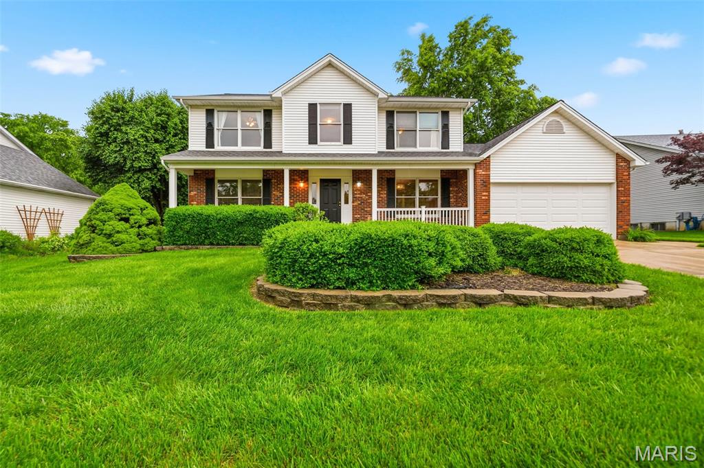 Spacious and beautifully updated 2-story in the sought-after Monticello neighborhood in O'Fallon offering 4 bedrooms, 3.5 bathrooms, and an open floor plan designed for comfortable living and entertaining! Hardwood floors run through much of the main level, featuring both a living room and family room for plenty of flexible living space. The living room showcases a gas fireplace flanked by built-in bookcases and opens seamlessly to the stunning kitchen and breakfast room. The kitchen is loaded with upgrades including granite countertops, breakfast bar, stainless steel appliances with 5-burner gas range, tile backsplash, recessed lighting, pull-out pantry and cabinet drawers.
Just off the kitchen is an additional sun-filled family room surrounded by windows with access to both the deck and patio overlooking the level, fully fenced backyard. The main level also includes a formal dining room, bonus home office/sitting room, and convenient laundry room where the washer and dryer stay!
Upstairs you’ll find all 4 bedrooms including a spacious primary suite with walk-in closet, dual sinks, jetted tub, and separate shower. Three additional bedrooms share a full hall bath. The finished lower level expands the living space with a large rec room, bar area, full bath, and abundant storage. Oversized garage with 8’ extension. Enjoy neighborhood amenities including a pool, clubhouse, and tennis courts. Located in the highly rated Francis Howell School District! Don’t miss your chance to own this spacious home with incredible living and entertaining space both inside and out — schedule your showing today!