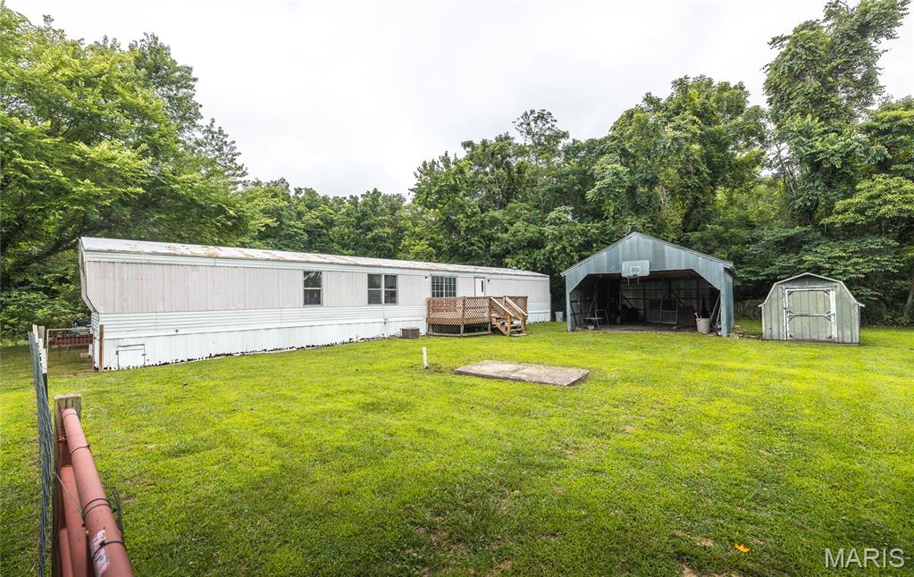 Unlock the potential of this unique multi-home investment opportunity nestled on approximately one acre within the Crocker city limits—offering the convenience of town with the peaceful feel of a private country setting. Whether you're looking for rental income, a multi-generational property, or your next renovation project, this one is packed with possibilities. The primary residence is a 1985 Clayton 16x80 manufactured home that has been affixed as real estate. Featuring 3 bedrooms, 2 full bathrooms, and a functional electric HVAC system, it's move-in ready while offering an opportunity to add your own updates with fresh flooring and paint. Also included are two additional homes, each with its own electric meter and water access already in place. One home offers solid bones and is ready for a complete renovation, while the other—a 3-bedroom, 1-bath home with an addition built on a concrete slab—needs remodeling but provides an excellent foundation for restoration. The secondary homes share a lagoon, making this an ideal setup for future rental units, guest homes, or expanded living space. To make the opportunity even more attractive, the seller is offering a $10,000 allowance with an acceptable offer, giving buyers extra flexibility to begin renovations right away. Properties with this much potential and room to grow don't come along often. Schedule your private showing today and explore the possibilities this one-of-a-kind property has to offer!
