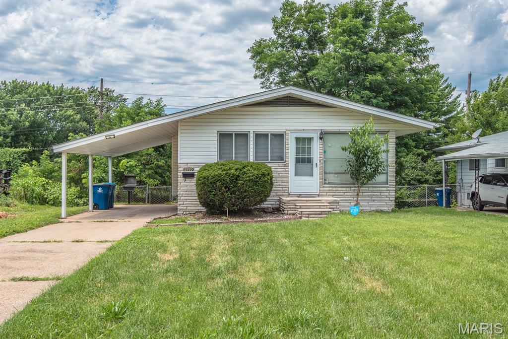 Welcome to 10205 Gourock Drive, a nicely updated 3 bedroom, 1 bathroom ranch home offering the perfect combination of move-in-ready living and strong investment potential. Freshly renovated with new paint throughout, newer appliances, updated fixtures, and numerous cosmetic improvements, this is a perfect property for an owner occupant or an investor looking to build their portfolio.

The bright and inviting main level features an open living and dining area with hardwood flooring and abundant natural light. The functional kitchen offers ample cabinet space and updated appliances, while three comfortable bedrooms, a full bath, and a central hall floor plan provide convenient single-level living.

The finished walkout lower level adds valuable flexible space that can serve as a family room, home office, recreation area, or additional storage. Outside, the fenced backyard offers plenty of room for pets, entertaining, or outdoor enjoyment, while the covered carport provides added convenience and protection from STL weather.

Owner occupants will appreciate the affordable opportunity to purchase a renovated, move-in-ready home with minimal immediate maintenance needs. Investors will recognize the strong rental appeal of the property's updated condition, practical floor plan, finished lower level, and convenient location. So, whether you're searching for your next home or your next investment rental house, 10205 Gourock Drive presents an outstanding value and a turnkey opportunity in an established neighborhood. Schedule your showing today!