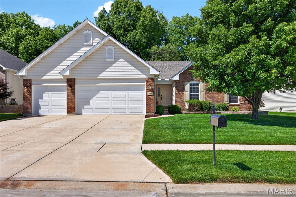 Welcome to this impeccable 3 bed/2 bath ranch with a private backyard! Open floor plan showcases the vaulted Great Room, Kitchen and Dining area. Gorgeous hardwood flooring throughout the home (with the exception of the bedrooms). Great Room boasts a gas fireplace with a brick front/mantle that is flanked by windows. Kitchen features beautiful cabinetry, granite countertops, SS appliances & large pantry. Convenient M/F Laundry Room with built-in drop zone area. Impressively sized Primary Suite has a tray ceiling & nice walk-in closet with built-ins. Primary bath offers extra-long double bowl vanity with plenty of drawer & cabinet space, soaking tub and separate shower.  Two bedrooms & add'l full bath complete the main level. 50-gallon HWH, Roof 2023, Electric & gas hook-ups for range. Fireplace can be converted to wood burning. Close to all of your favorite shopping, restaurants and conveniently located near major highways! Truly move-in ready!