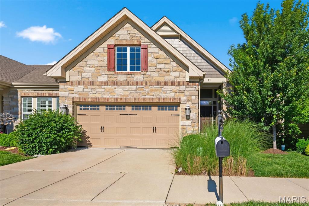 Exceptional location, stylish finishes, and low-maintenance living come together in this beautifully updated 2-bedroom, 2-bath villa in one of Ballwin's most convenient locations. Tucked just off Clayton Road near the intersection of Clarkson and Clayton, this home places shopping, dining, entertainment, Lifetime Fitness, and everyday conveniences just steps from your door, while providing quick access to major highways throughout the metro area.
From the moment you arrive, the attractive stone elevation sets the tone for what awaits inside. Vaulted ceilings, hardwood floors, and an open-concept design create a bright, spacious feel throughout the main living areas. The great room serves as the heart of the home, featuring a gas fireplace, recessed lighting, and large windows that fill the space with natural light.
The kitchen is both elegant and functional, showcasing Silestone countertops and matching backsplash, stainless steel appliances, double wall ovens, under-cabinet lighting, and a breakfast bar that keeps everyone connected whether entertaining guests or enjoying a quiet evening at home. The adjoining dining area opens to a composite deck, offering the perfect place to enjoy your morning coffee or unwind at the end of the day.
A desirable divided-bedroom floor plan provides privacy for owners and guests alike. The spacious primary suite features a generous 13' x 8' walk-in closet and a well-appointed bath with dual vanities, separate soaking tub and shower, and linen storage. A second bedroom, full bath, and main-floor laundry complete the living space.
The unfinished lower level offers outstanding expansion potential with an egress window and bath rough-in already in place—ready for future recreation, guest, or hobby space. Additional features include plantation shutters, upgraded lighting throughout, a 2-car attached garage, neighborhood walking trails, and sought-after Rockwood schools, including Marquette High School.
Whether you're looking to simplify your lifestyle without sacrificing space or searching for a home that combines luxury and convenience, this villa delivers on every level.