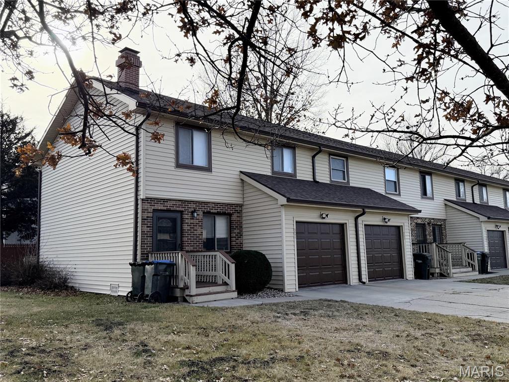 This town home located close to AT Still University and Northeast Missouri Regional Hospital is renovated and move-in-ready. An end unit, this home has two bedrooms, one and a half baths, in-unit laundry and an attached garage. The complex also has had exterior updates including new garage doors, new roofs and new front porches. A great investment opportunity, also available Unit 911.