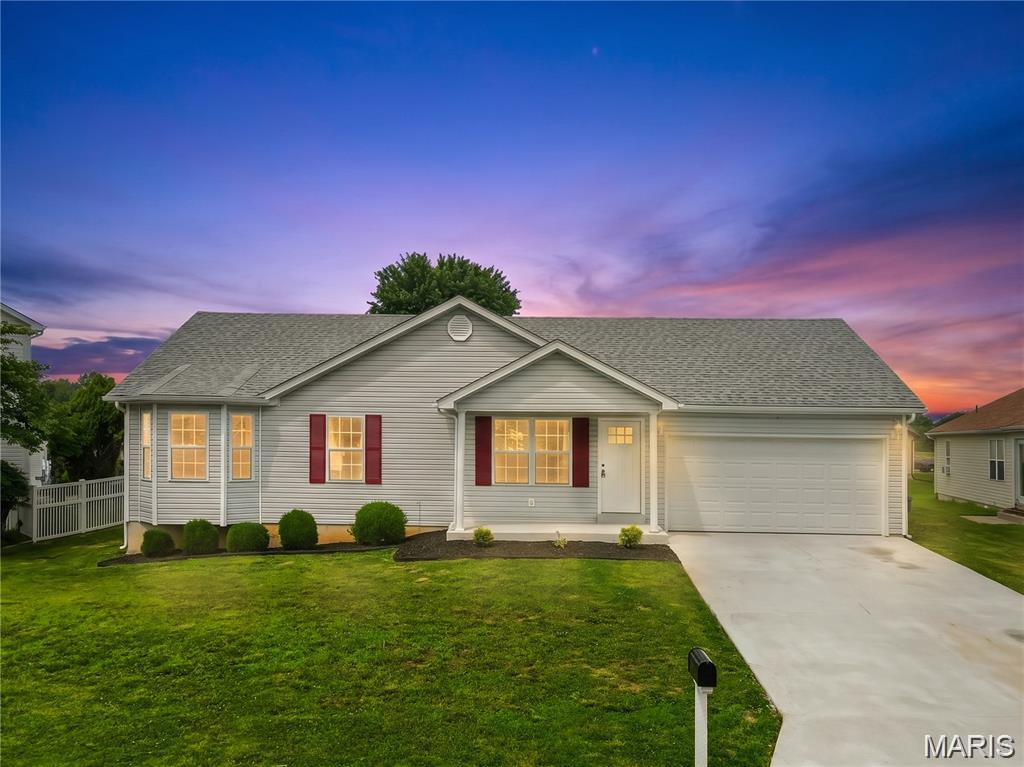 Prepare to be impressed! This beautifully renovated ranch offers the feel of new construction with the charm and space of an established neighborhood. Situated on a generous 1/3-acre lot, this move-in-ready home has been extensively updated from top to bottom.

The open great room floor plan features brand-new luxury vinyl plank flooring throughout—absolutely no carpet! The stunning kitchen is designed to impress with 42" cabinets accented by crown molding, granite countertops, stainless steel appliances, and abundant storage. Granite countertops continue into the bathrooms, while new two-panel doors throughout provide a fresh, modern touch.

Three bedrooms are conveniently located on the main level, along with MAIN FLOOR LAUNDRY, while the lower level offers even more versatility with a newly added egress window, spacious 4th bedroom, and brand-new full bath—perfect for guests, teens, or a private home office. The unfinished portion of the basement provides plenty of room for storage or future expansion.  See floorplans at end of photos.

Step outside to enjoy the new deck and patio overlooking the expansive backyard. An oversized garage offers extra depth for larger vehicles, recreational toys, or the workshop you've always wanted.

With extensive upgrades inside and out, this exceptional home truly delivers the best of both worlds—the style and finishes buyers love, with the space and setting that are hard to find. Welcome home!