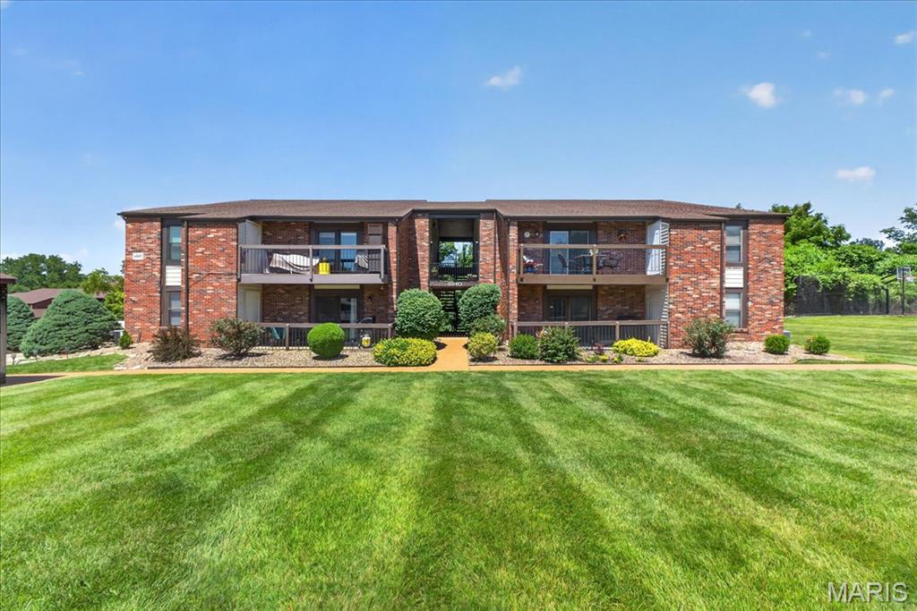 Open House 6/13 10am-12pm * Don't miss this beautifully updated upper-level end-unit condo! You'll love the open, inviting feel with updated laminate plank flooring throughout, a cozy wood-burning fireplace, and a stylish accent wall that adds character to the dining area. Step outside to your private balcony with extra storage space, and enjoy the convenience of in-unit washer and dryer hookups. Featuring 2 spacious bedrooms and 2 full bathrooms, this home offers a functional layout and comfortable living. One covered carport space and one additional parking space are included. Enjoy community amenities including a pool, tennis courts, walking trails, parks, and lakes - all in a convenient location. Move right in and start enjoying the lifestyle!