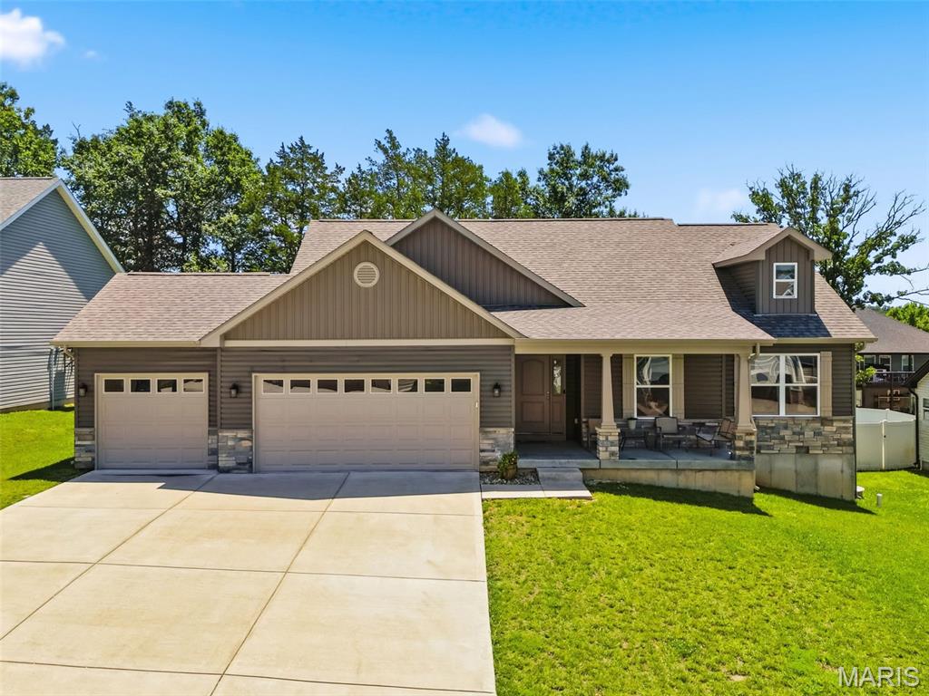 Why settle for one level of luxury when you can have two? At only four years old, this stunning ranch in Auburn Lakes offers exceptional living space on both the main and lower levels. The open-concept design features warm hardwood flooring, granite countertops, custom cabinetry, stainless steel appliances, and a spacious center island perfect for gathering and entertaining.

The private primary suite boasts a spa-inspired bath complete with a soaking tub, walk-in tile shower, his and her sinks, huge walk-in closet, and modern fixtures. Two additional bedrooms, a full bath, and a convenient main-floor laundry room complete the thoughtfully designed split-bedroom floor plan.

The walkout lower level expands the home's versatility with additional living space, a kitchenette, two sleeping areas, and a full bath completely remodeled—ideal for multigenerational living, extended guests, or a private retreat. Luxury vinyl plank flooring and quality finishes create a seamless extension of the home's upscale feel. 

Additional highlights include a 200-amp electrical service, modern mechanical systems, and the peace of mind that comes with a nearly new home. This stunning home offers the perfect blend of style, function, and flexibility.  Don't miss your chance to make 512 Hickory Knoll your new address!