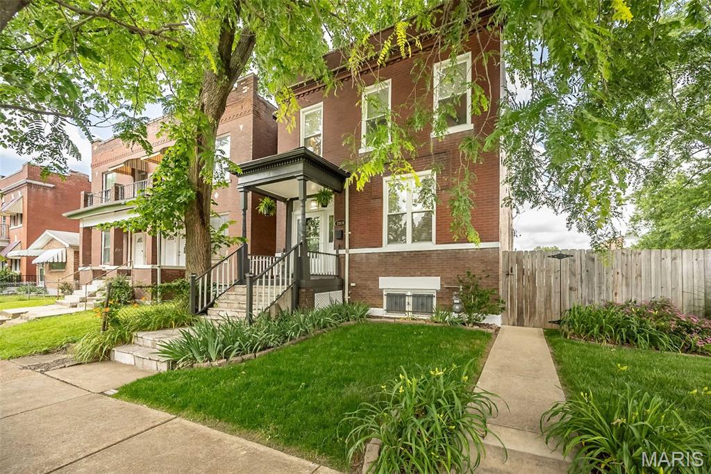 Popular Tower Grove East Neighborhood! Urban living at its best! Beautifully updated brick home located within walking and biking distance to Tower Grove Park, MO Botanical Gardens, local restaurants, shops, and some of St. Louis’ best attractions, yet the rare DOUBLE LOT (Included in the sale is 2354 Virginia Ave -vacant adjoining lot) gives this property a surprisingly suburban feel. Directly across from the community gardens, this home offers the perfect blend of city convenience and outdoor charm.
Inside, loads of natural light flood the main floor, highlighting the real wood flooring, exposed brick gas fireplace, recessed lighting, and fresh paint throughout. The spacious kitchen features a large center island, gas stove, and easy access to the deck overlooking the fully fenced backyard complete with a firepit — perfect for entertaining or relaxing evenings at home. 
Upstairs you’ll find 3 bedrooms, 2 baths, convenient second-floor laundry, new carpet, and a thoughtfully designed layout including a Jack-and-Jill bath between bedrooms 2 and 3. The spacious primary suite offers a large private bath with a separate tub and shower.
Additional features include a covered front porch, covered off-street 2-car garage port, and countless updates completed by a seller who has truly prepared this home for its next owner. Don’t miss this incredible opportunity!