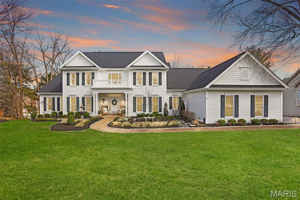 **OPEN HOUSE CANCELLED, Home is now Under Contract**Experience luxury living in this stunning 1.5-story home in Wildwood, perfectly positioned on a picturesque lot backing to trees with beautiful lake views and walking distance to the subdivision pool and tennis courts. From the moment you step inside, you’re welcomed by a grand two-story foyer with soaring ceilings and beautifully refinished hardwood floors that flow throughout the main level. The thoughtfully designed layout features a private study, elegant formal dining room, and an impressive two-story great room with fireplace filled with natural light.

The gourmet kitchen is truly the heart of the home, showcasing updated quartz countertops, farmhouse sink, and high-end appliances including a 6-burner gas cooktop and refrigerator. Designed with entertaining in mind, the space offers a large center island, abundant cabinetry, walk-in pantry, breakfast bar seating, and a bright breakfast nook. Just off the kitchen, a beautifully updated wet bar features a beverage refrigerator, sink, and wine rack—perfect for hosting guests. The kitchen seamlessly opens to a vaulted family room with stunning stone fireplace, creating a warm and inviting gathering space. The main level also includes a laundry room with half bath, plus an additional half bath for guests.

Retreat to the luxurious main-floor primary suite, complete with vaulted ceilings and a spa-inspired bath featuring separate his-and-her vanities, soaking tub, glass walk-in shower, heated marble flooring, and two walk-in closets with custom closet systems.

Upstairs offers four additional bedrooms, including two bedrooms connected by a Jack-and-Jill bath with separate vanities and shower/tub combo, while two more bedrooms share a beautifully appointed hall bath with large vanity and glass shower. All closets throughout the home feature custom closet systems, providing exceptional organization and storage.

The fully remodeled walkout lower level is an entertainer’s dream. Highlights include a spacious recreation room with limestone fireplace, a full updated kitchen with granite counters, custom cabinetry, sink, dishwasher, microwave, and beverage refrigerator, and a temperature-controlled wine cellar with capacity for over 500 bottles. The lower level also features a sitting/bonus room, a dedicated theater room with surround sound and new projector, plus an exercise room, hobby room, and half bath. A private lower-level bedroom with ensuite bath featuring a walk-in shower and large vanity provides the perfect space for guests.

Additional features include an in-home elevator, screened-in porch, deck, and patio for enjoying the scenic backyard/lake view. The 4-car garage features epoxy-coated floors and a custom steel locker storage system. With newer systems and a new roof installed in 2023, this home offers the perfect blend of luxury, comfort, and thoughtful updates.

This exceptional Wildwood home truly has it all.