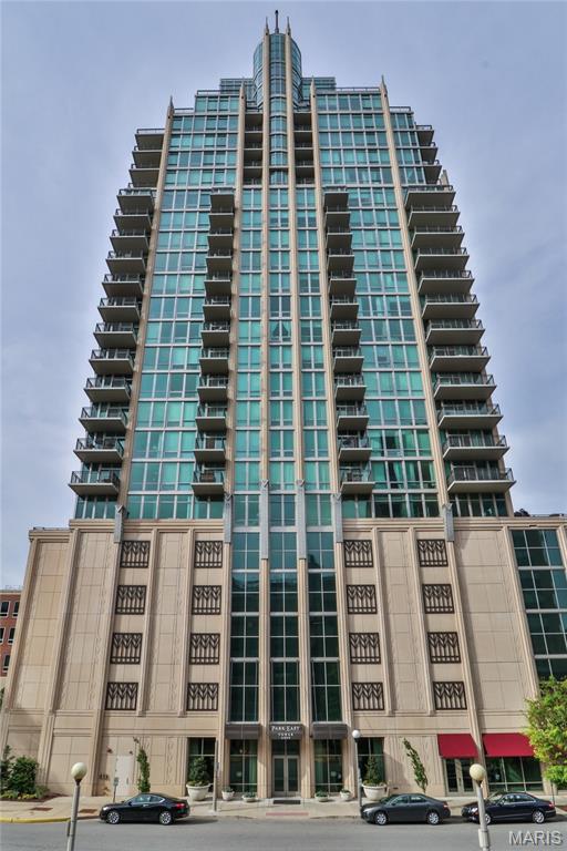 This condo is one block from BJC/WU Medical Center. A former owner of this two bedroom two full bath condo renovated in 2012/2013 with $66,320 worth of improvements. Newer washer/dryer, refrigerator and dishwasher 2023-2024. It has a kitchen with a Wolf gas range, hooded vent, wine cooler, beverage cooler, extra large sink, a pantry, extra cabinets and granite countertops. The main bedroom has added cabinets by the door along with a walk-in closet done by New Space. Both baths have granite tops with white sinks. Closet organizers by New Space are in the front hall closet, laundry closet, and second bedroom closet. Most light fixtures and fans have been changed for a contemporary look. There is a balcony off of the main bedroom (south facing) and the Great Room for morning coffee or cocktails to watch the sunset over Forest Park/Clayton. Washer and dryer stay. Parking space #1 on the second floor and a storage locker on the first floor, #23. Amenties: pool, spa, fitness center, Community Room and Door attendant 24/7 with a manager on site Monday-Friday.
